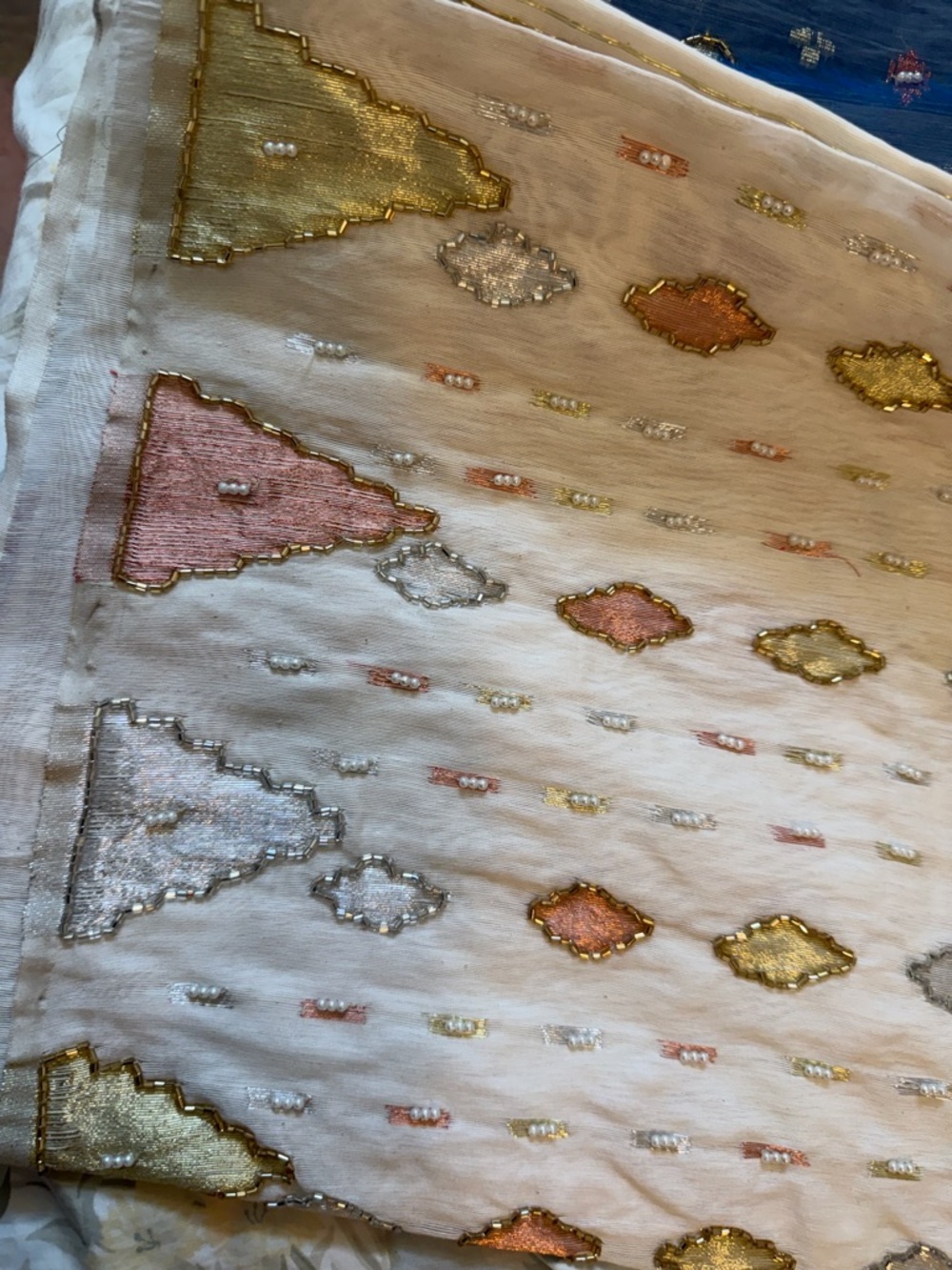 Embroidered White Handloom Textile with Metallic Accents